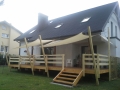 Toldo vela impermeable cuadrado 3x3 m Premium instalado sobre la terraza de una vivienda unifamiliar