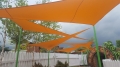 Vela triangular impermeable 5x5x7m, resistente a los rayos UV.