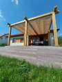 Vela ombreggiante scorrevole Premium impermeabile 2,5x3 m montata su una pergola in legno vicino alla terrazza