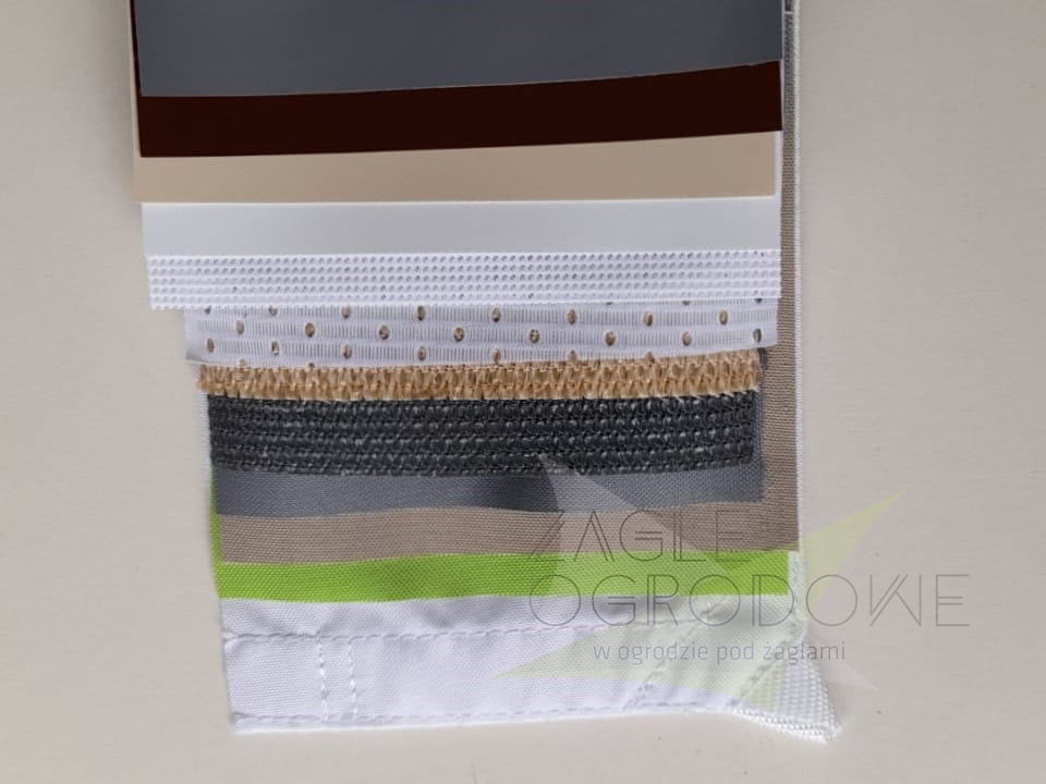 Professzionális textil mintakészlet különféle struktúrákkal és színekkel, a fehértől a sötétbarnáig