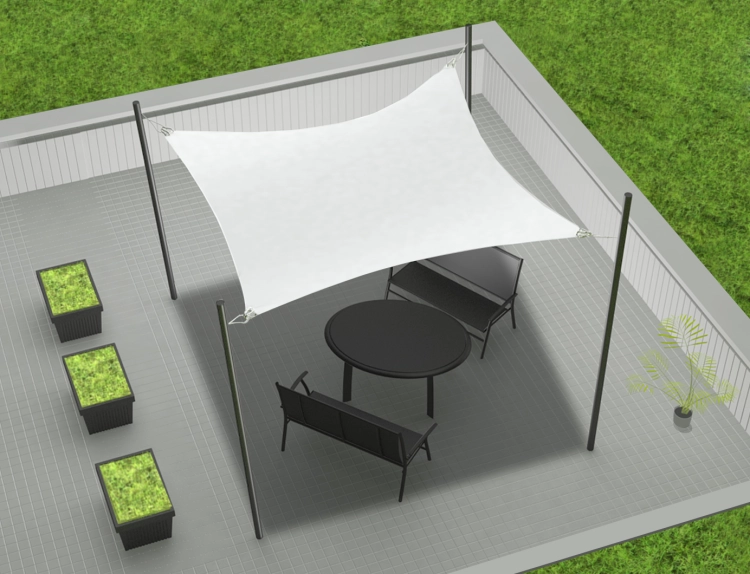 Voile d'ombrage rectangulaire blanc 3x4,5 m au-dessus d'un salon de jardin noir sur une terrasse grise