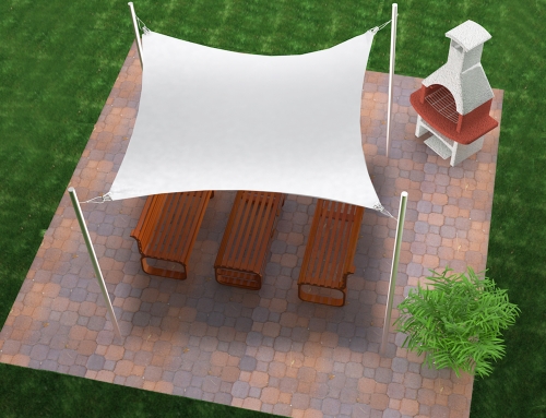 Voile d'ombrage imperméable blanche 3x5 m au-dessus d'un salon de jardin en bois et d'un barbecue sur la terrasse